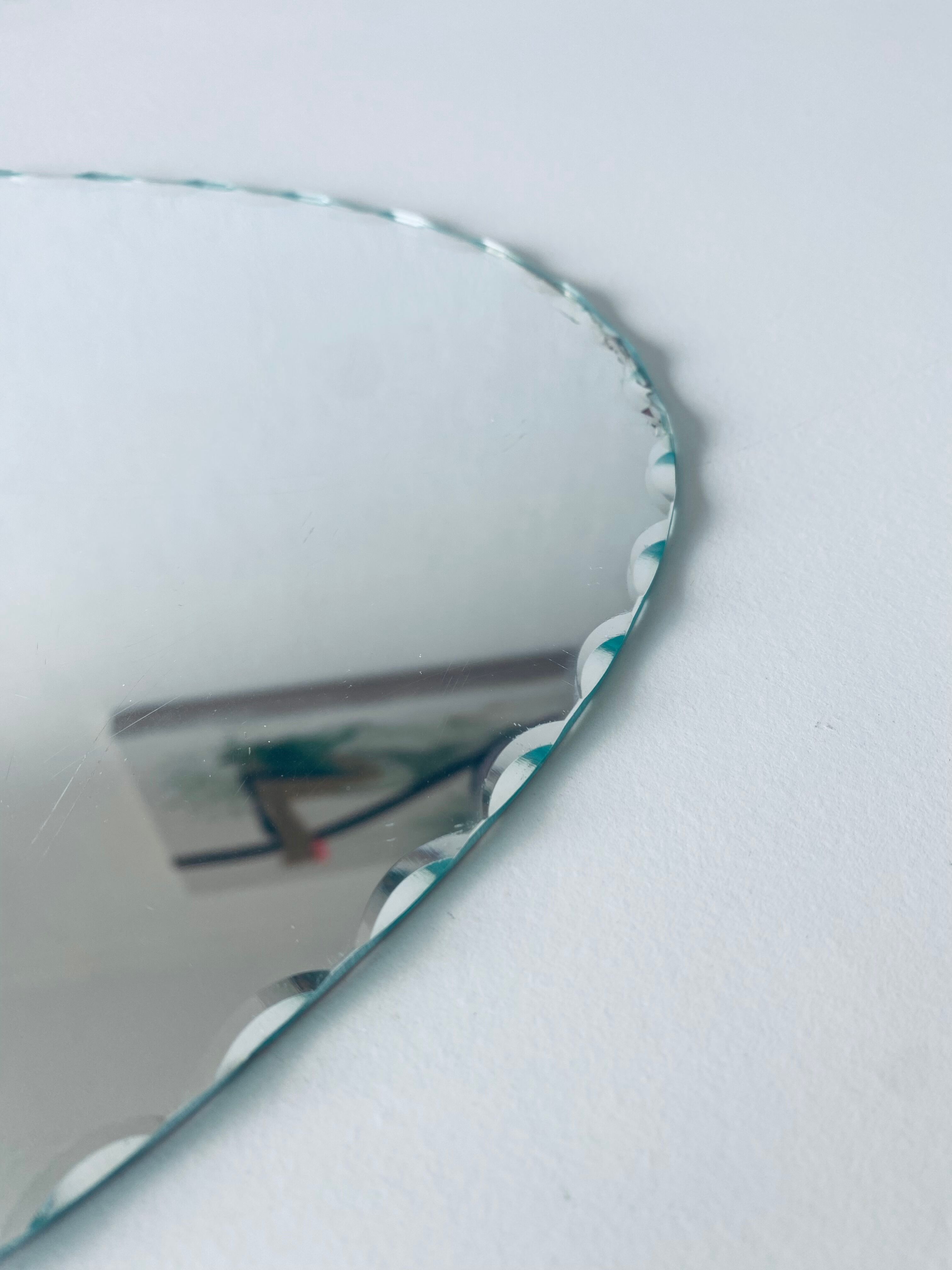 Oval beveled mirror 50x25cm