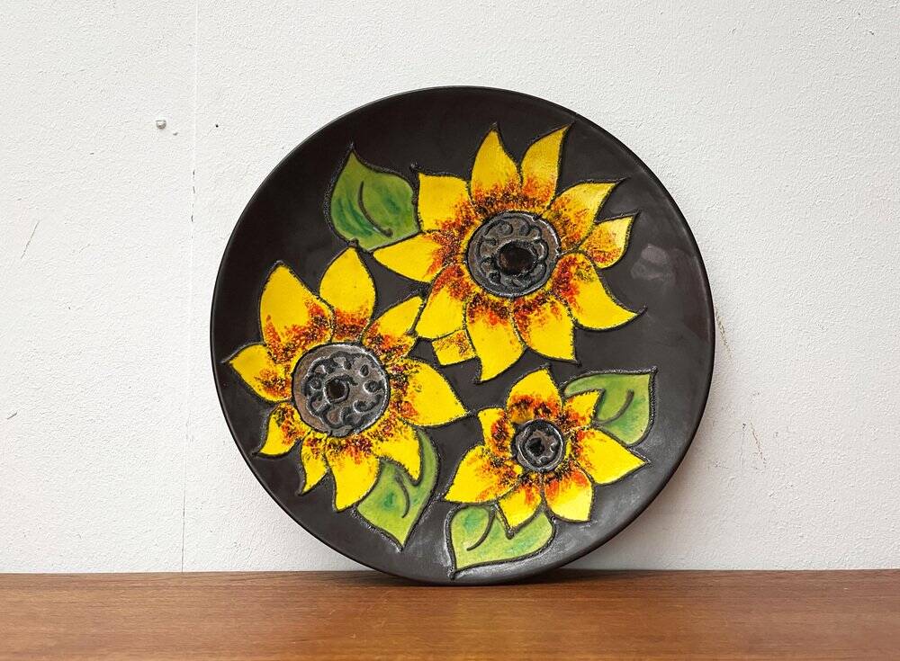 Mid-century German studio pottery wall plate with Ruscha sunflower motif, 1960s.
