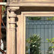 Imposing fireplace mirror in carved and painted wood, 19th century.