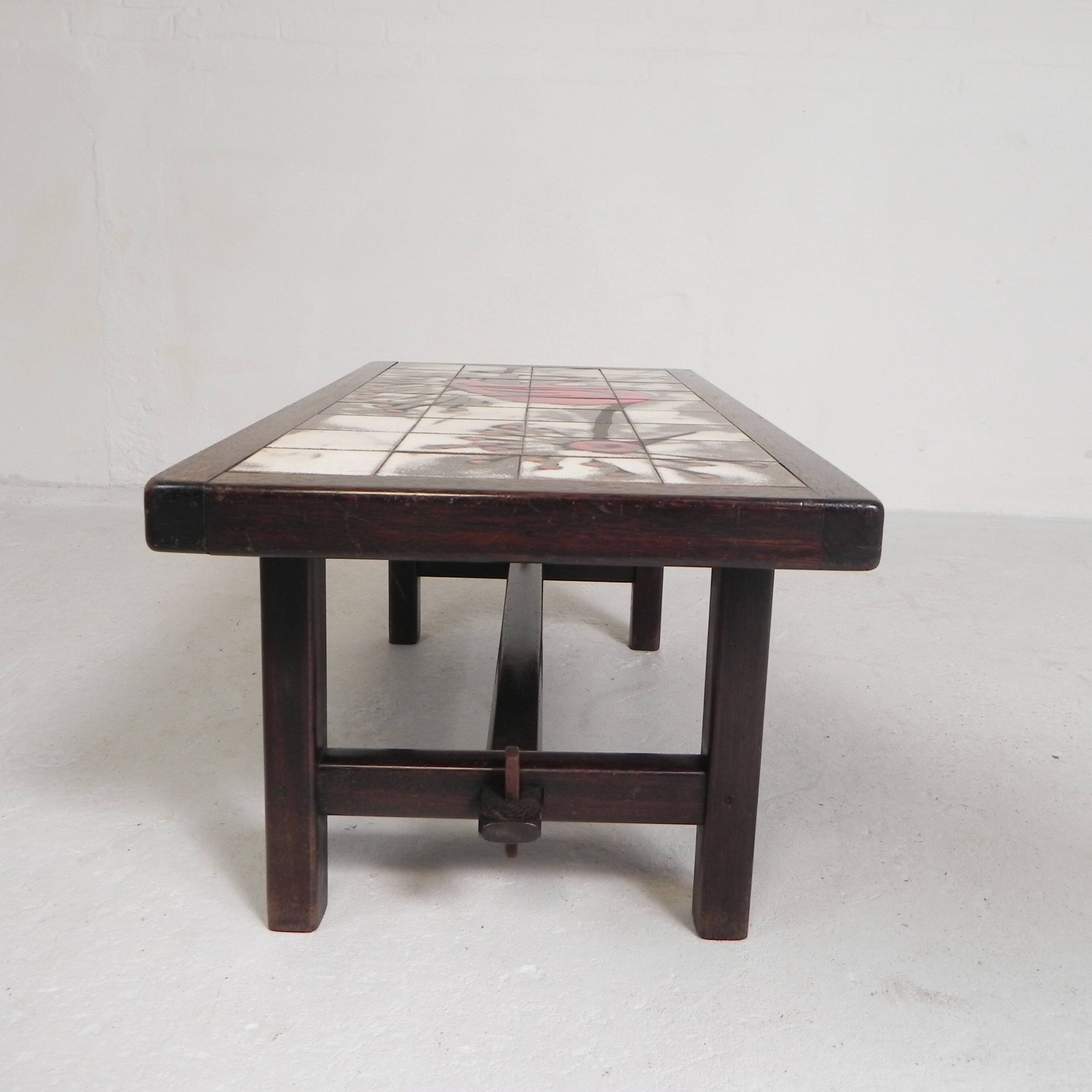 Square tile table from Vallauris, signed Dan with an image of a fantastic bird, 1960s.