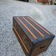 Old travel trunk in oilcloth