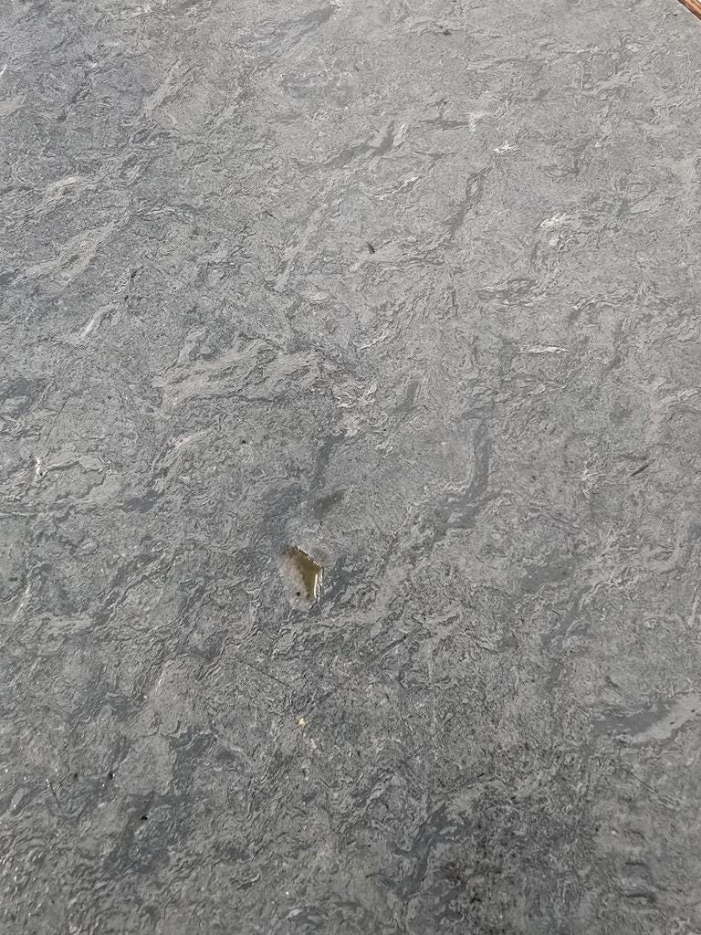 Vintage wooden table with a mint green top.