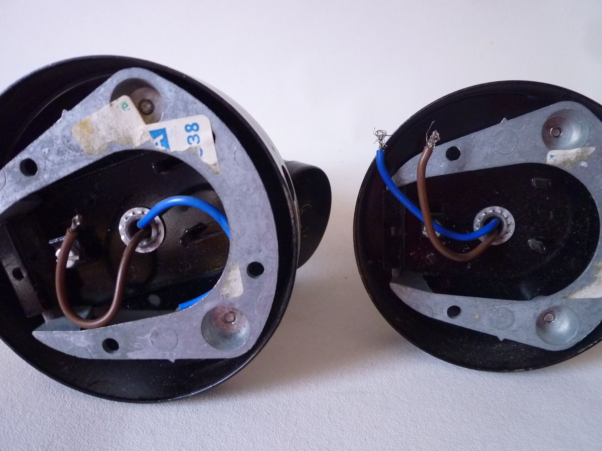 Pair of Zodiac sconces, C. Biny