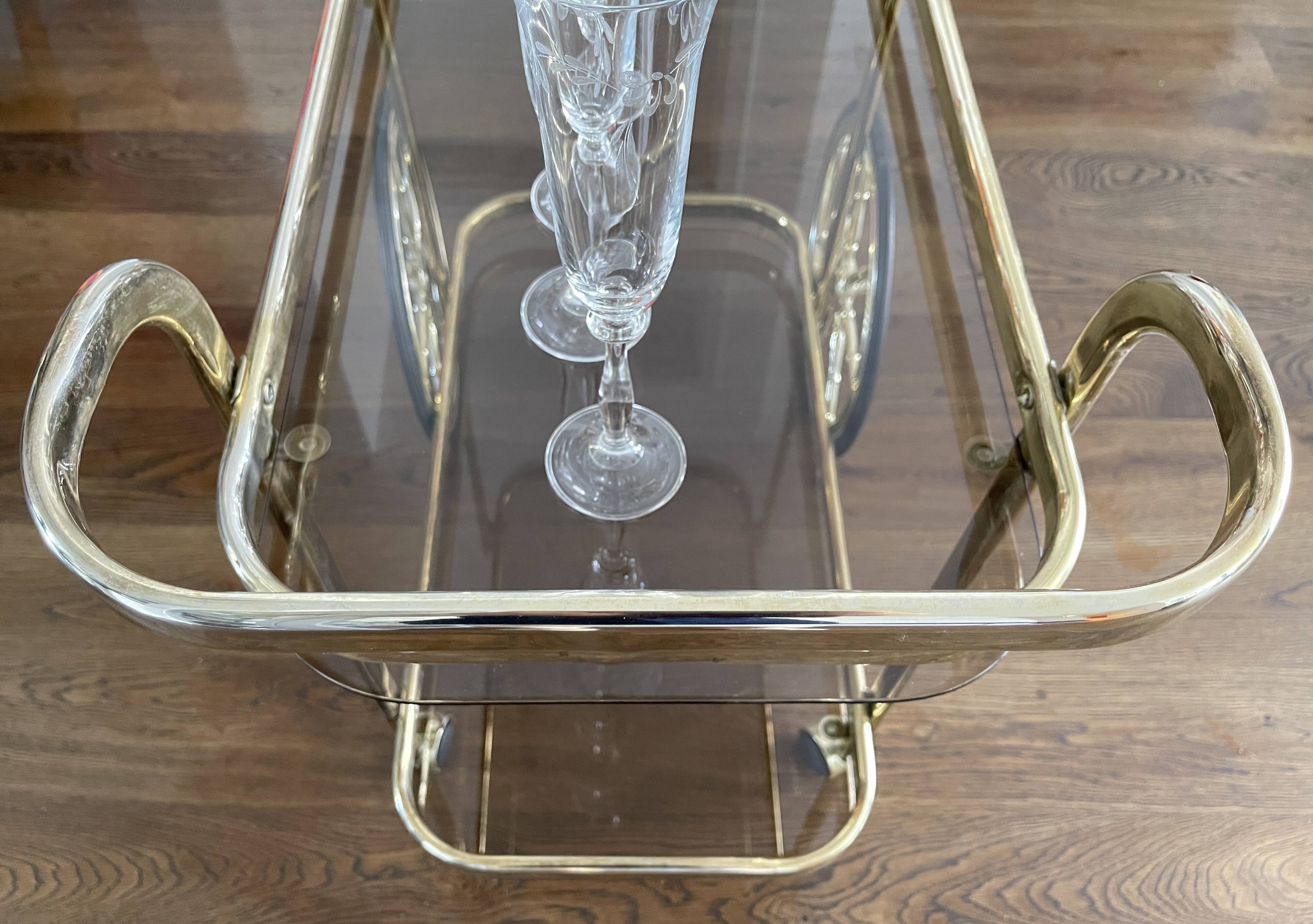 Brass and smoked glass bar trolley, 2 trays