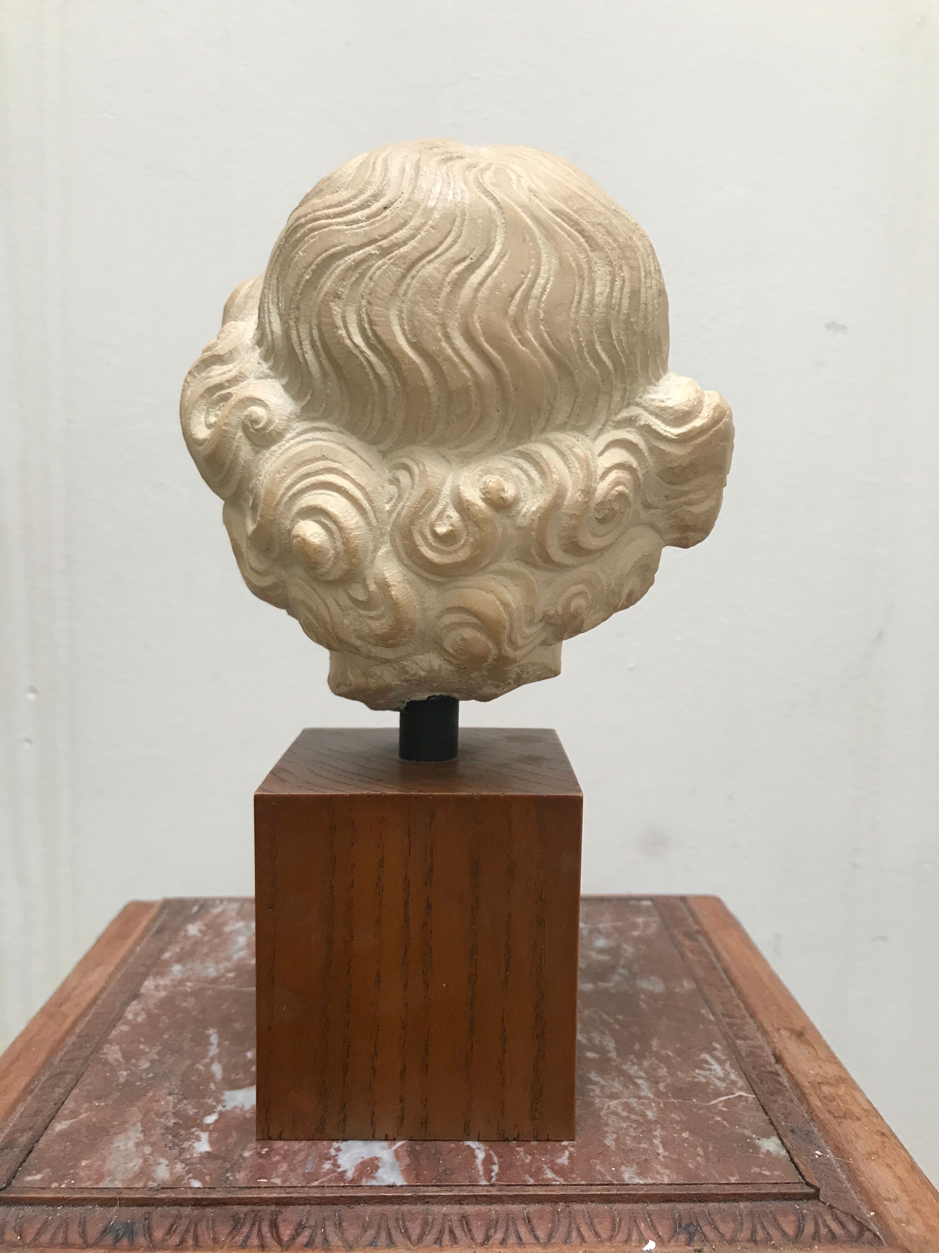 Bust angel head Louvre Museum