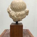 Bust angel head Louvre Museum