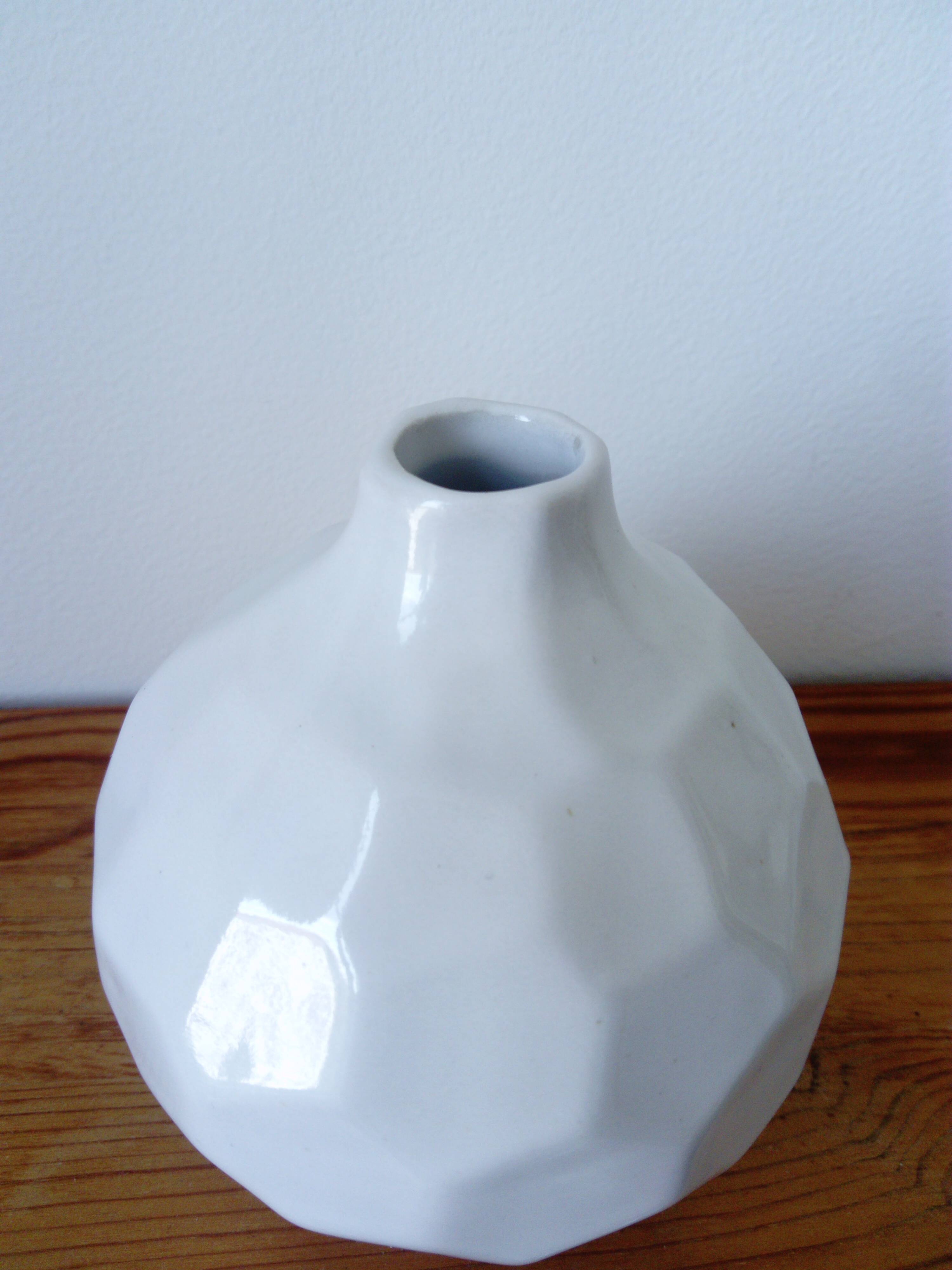 white ceramic faceted design vase