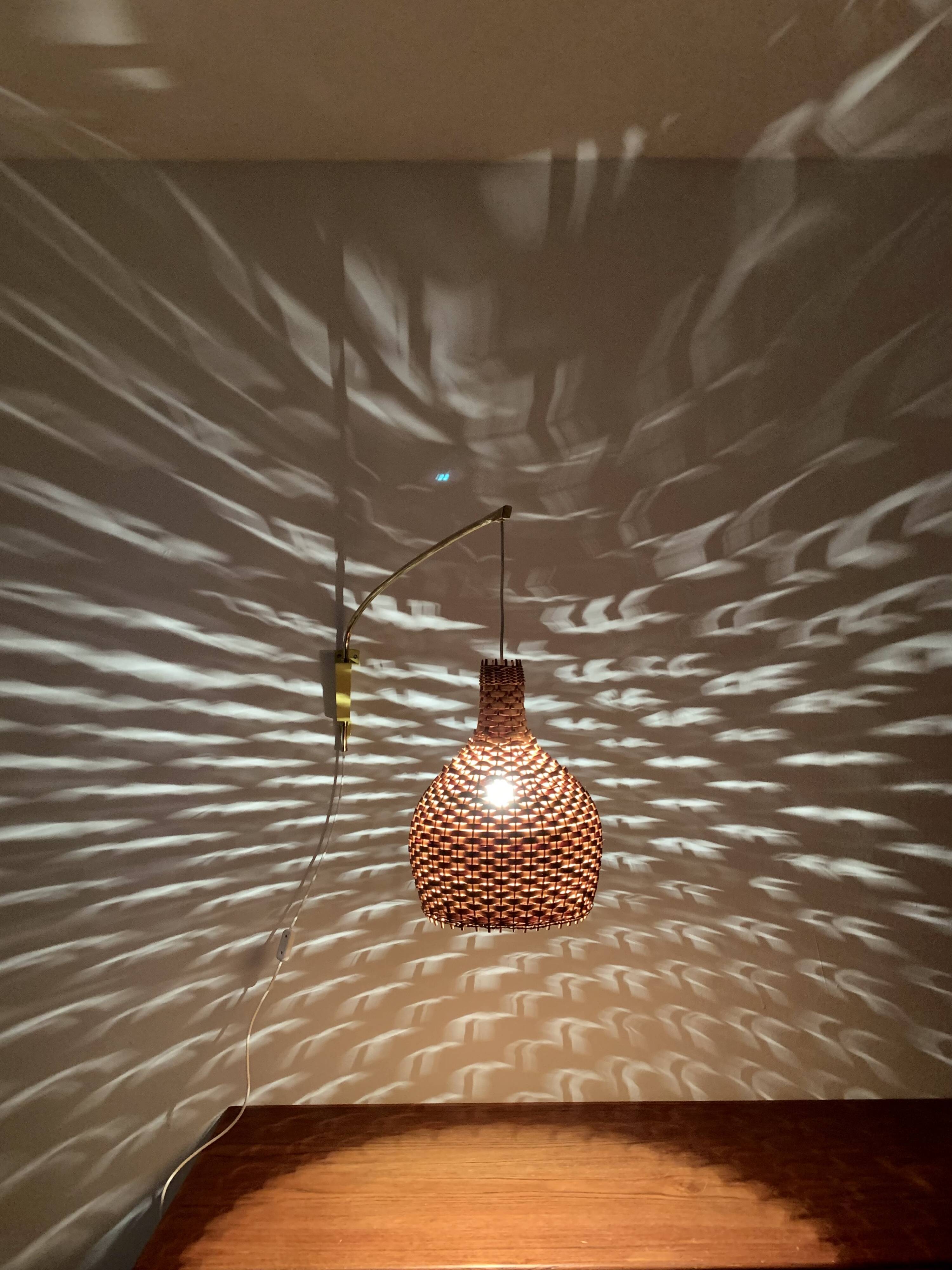 Adjustable Brass and Wicker Arc Sconce