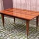 Scandinavian extendable dining table in lacquered wood and rosewood, 150cm.