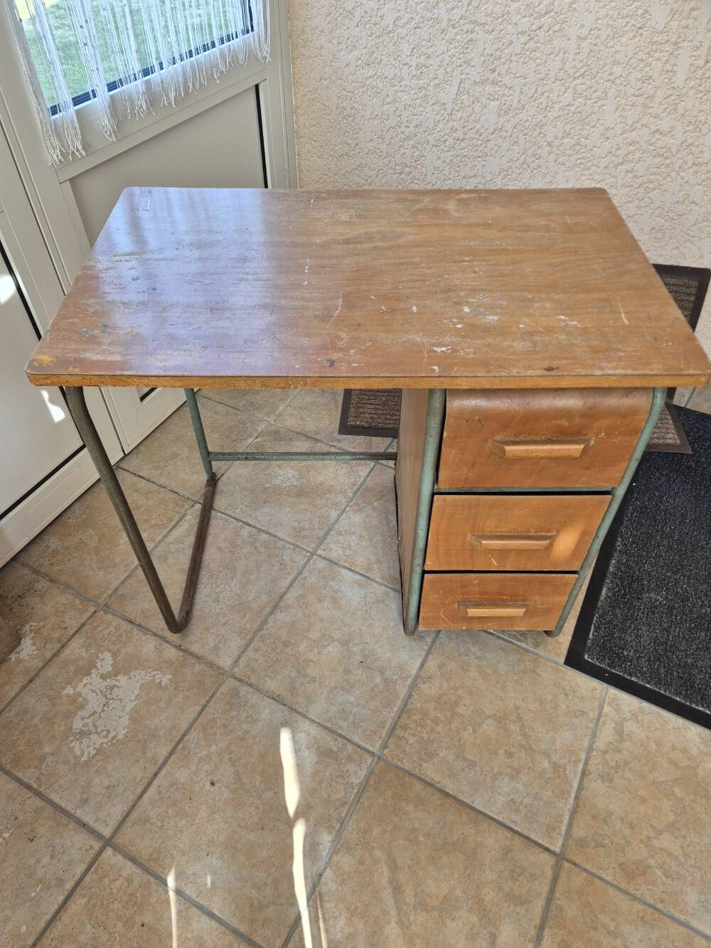 Child's desk with chair in its original condition.
