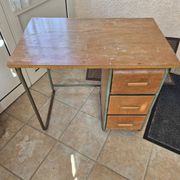 Child's desk with chair in its original condition.