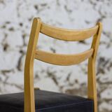 Pair of Scandinavian chairs in teak and faux leather, 1960.