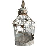 Vintage hexagonal metal birdcage from around 1940.