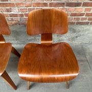 Set of 4 DCW chairs in walnut, Charles & Ray Eames, Herman Miller, 1950s