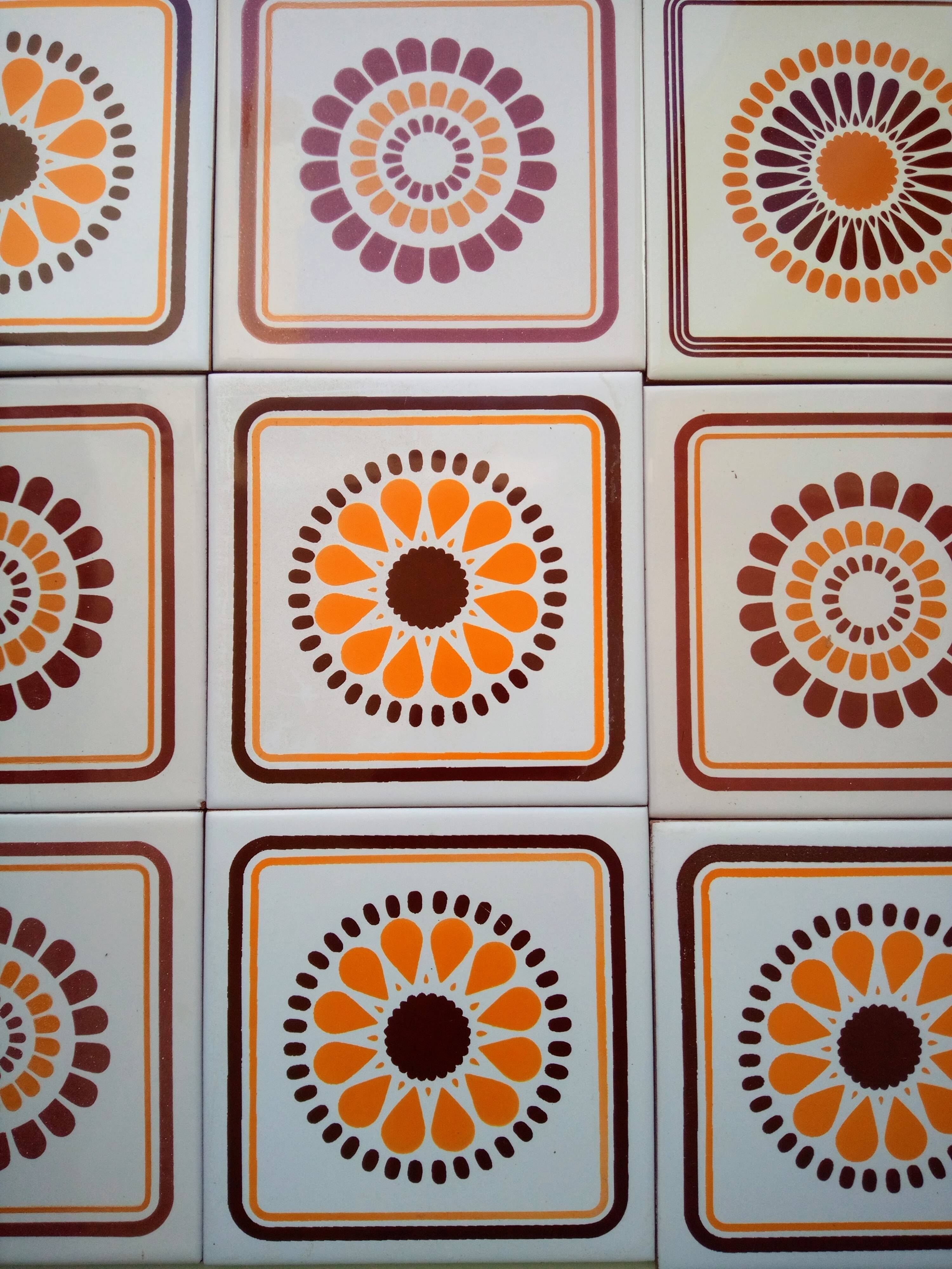 Set of decorative tiles from the 70s, orange pop flowers