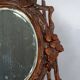 Antique small beveled mirror with carved wooden frame and waxed patina C714