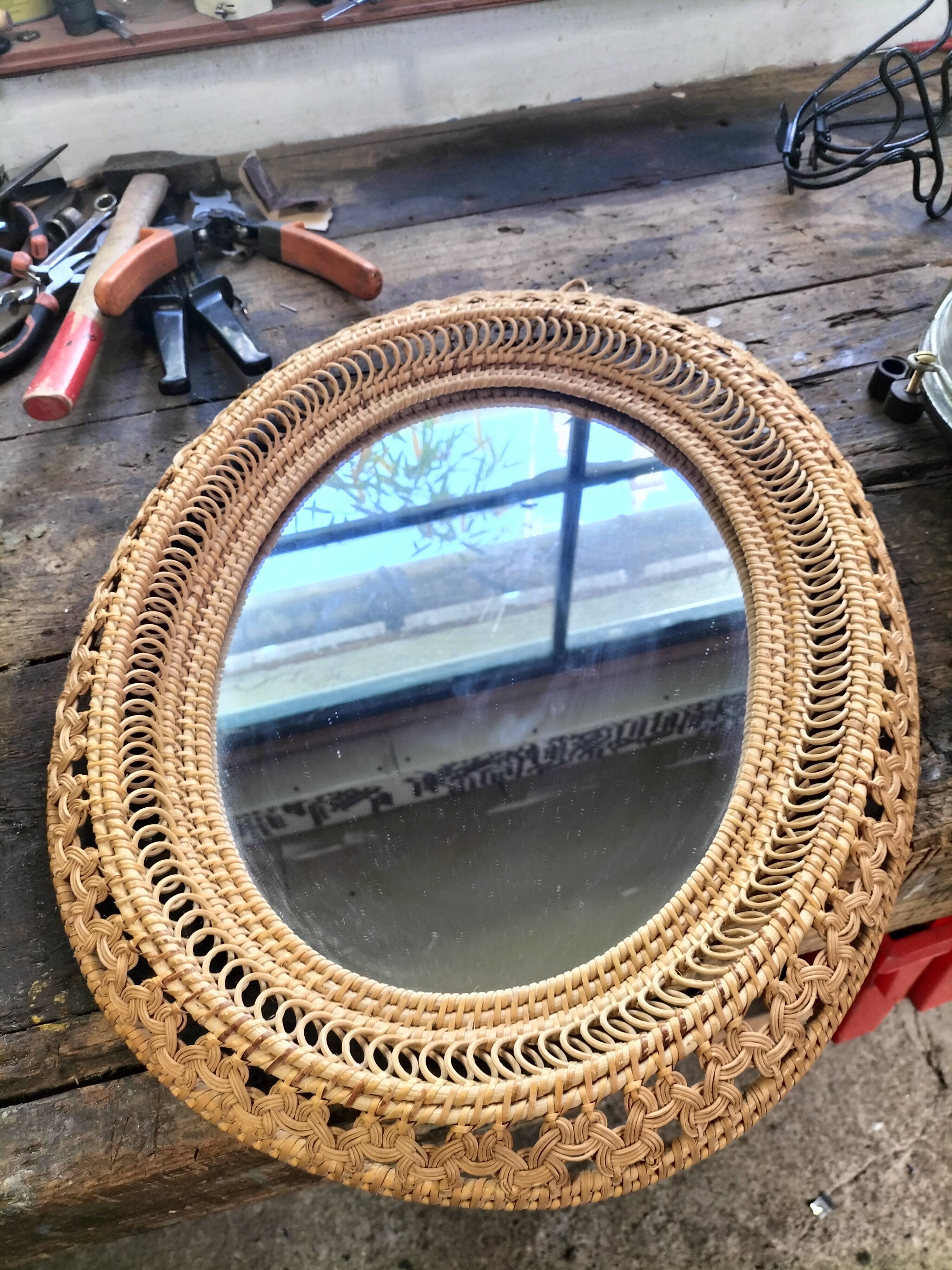 Oval rattan mirror