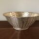 Braided silver metal basket