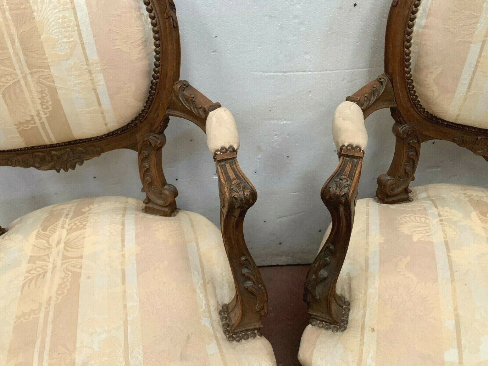 Pair of 20th century walnut rock armchairs