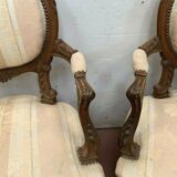 Paire de fauteuils rocaille en noyer XXe siècle