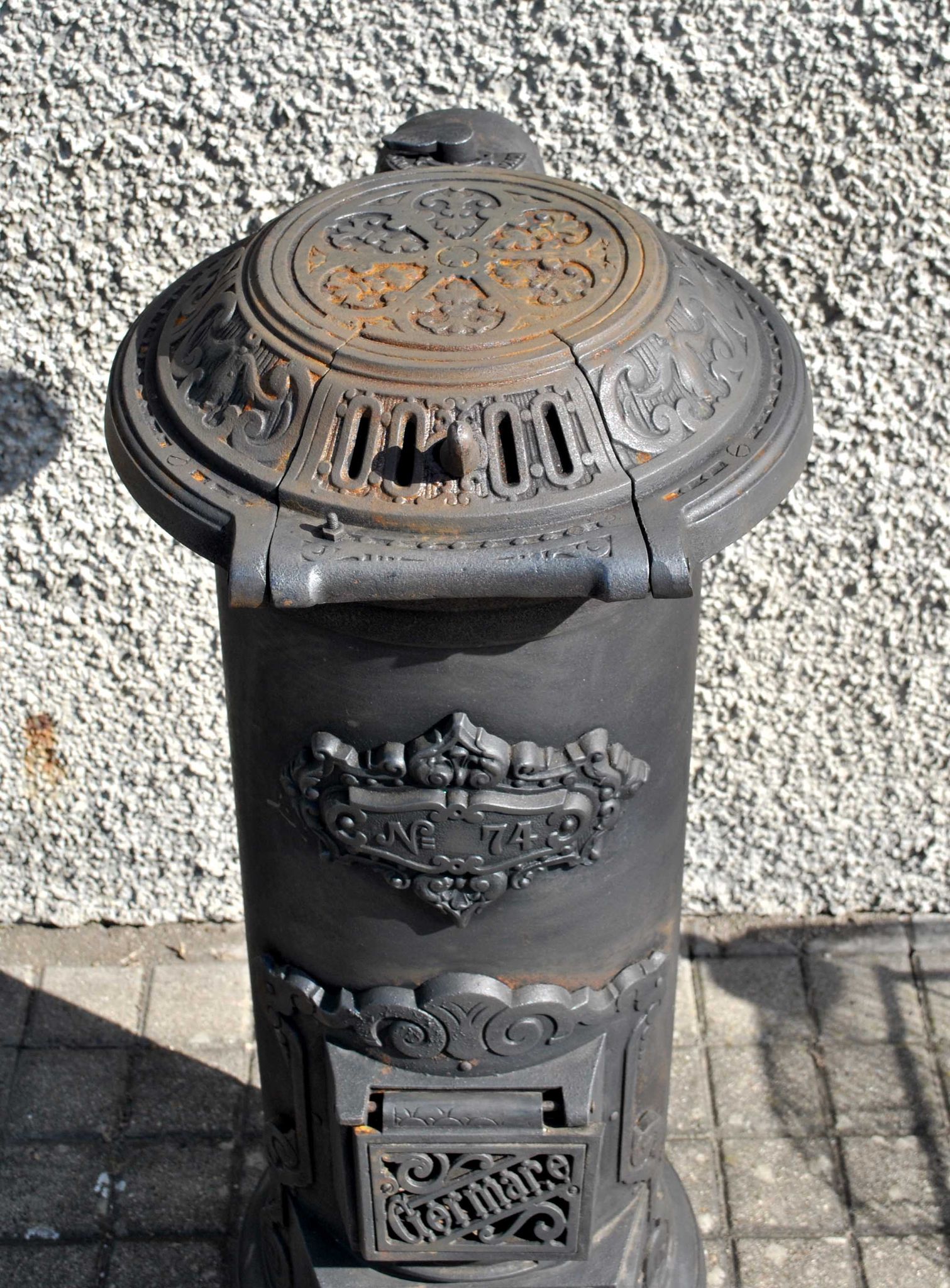 Antique decorative stove in black cast iron Germare charcoal