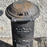 Poêle décoratif ancien en fonte noir Germare charbon bois