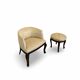 An antique Italian bar chair and a matching tufted vanity stool.