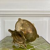 Brass cherub pocket-empty ashtray