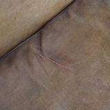 Sheep leather wingback chair with patina