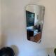 Asymmetric mirror with wood frame, 1960s