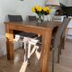 Ethnicraft teak dining table with slice extension