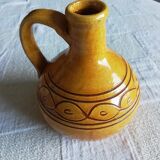 Glazed ocher round pitcher with handle