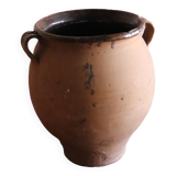 Old glazed terracotta olive jar