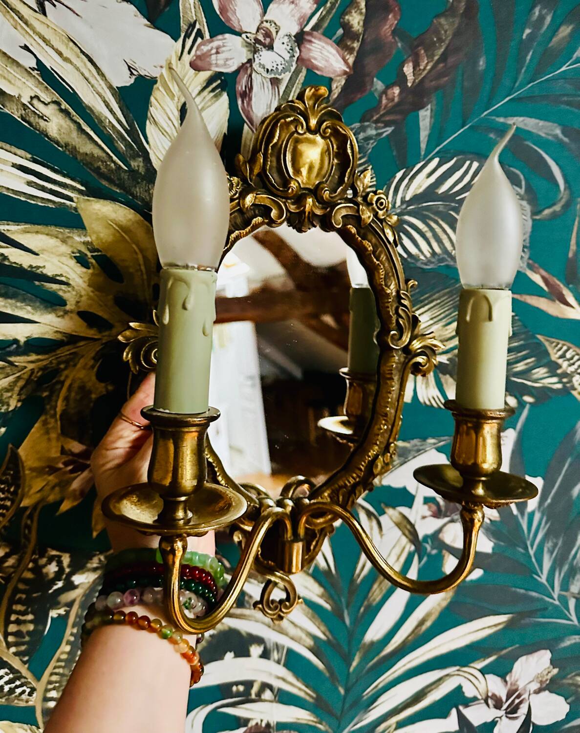 Antique bronze mirror wall sconce