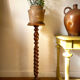 Antique pedestal table with a twisted column.