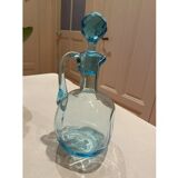 Blue carafe with vintage button