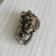 Large antique style brass metal knocker.