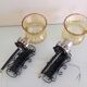 Pair of vintage iron and smoked glass