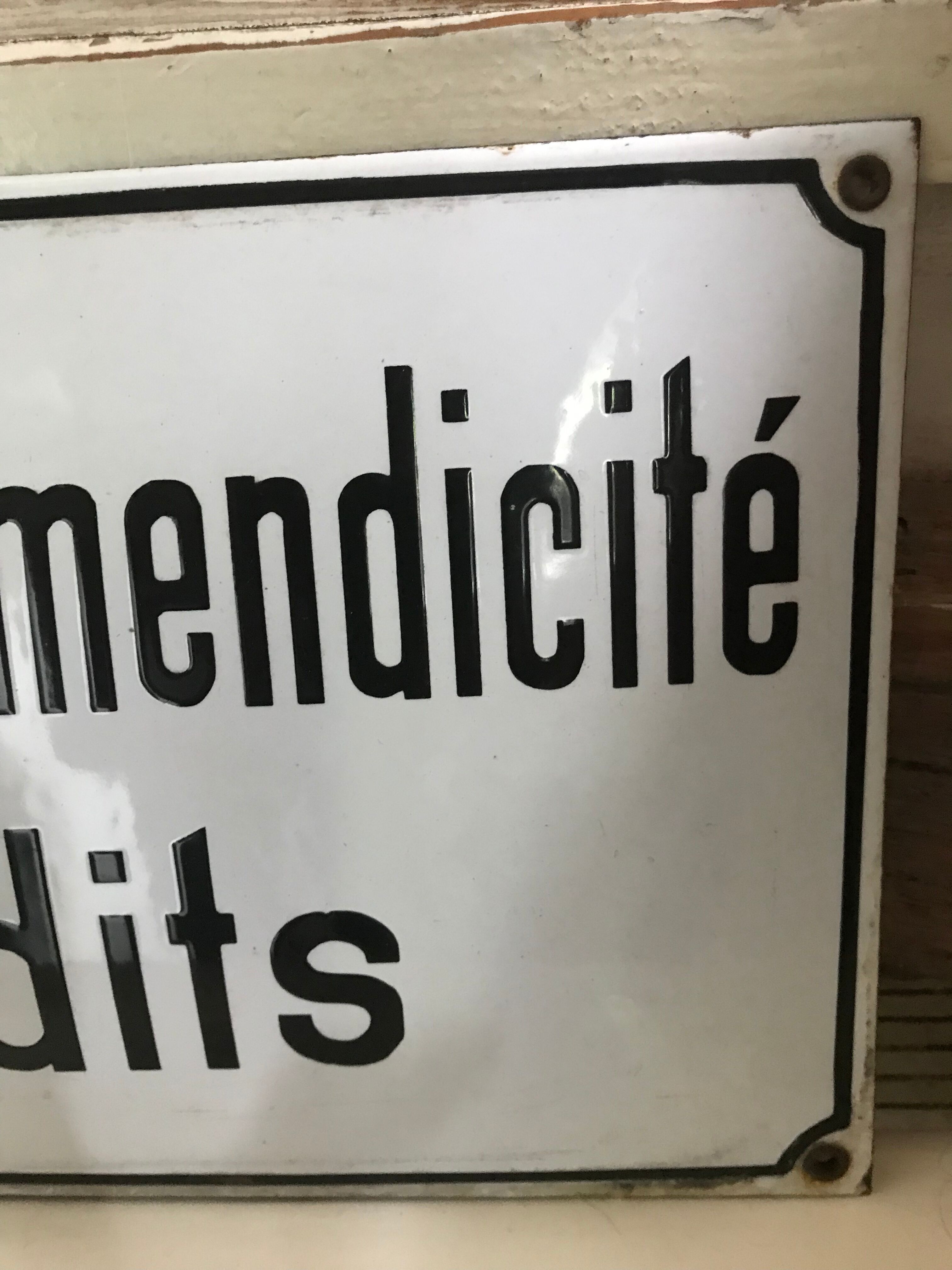 Enamelled plate peddling and begging prohibited