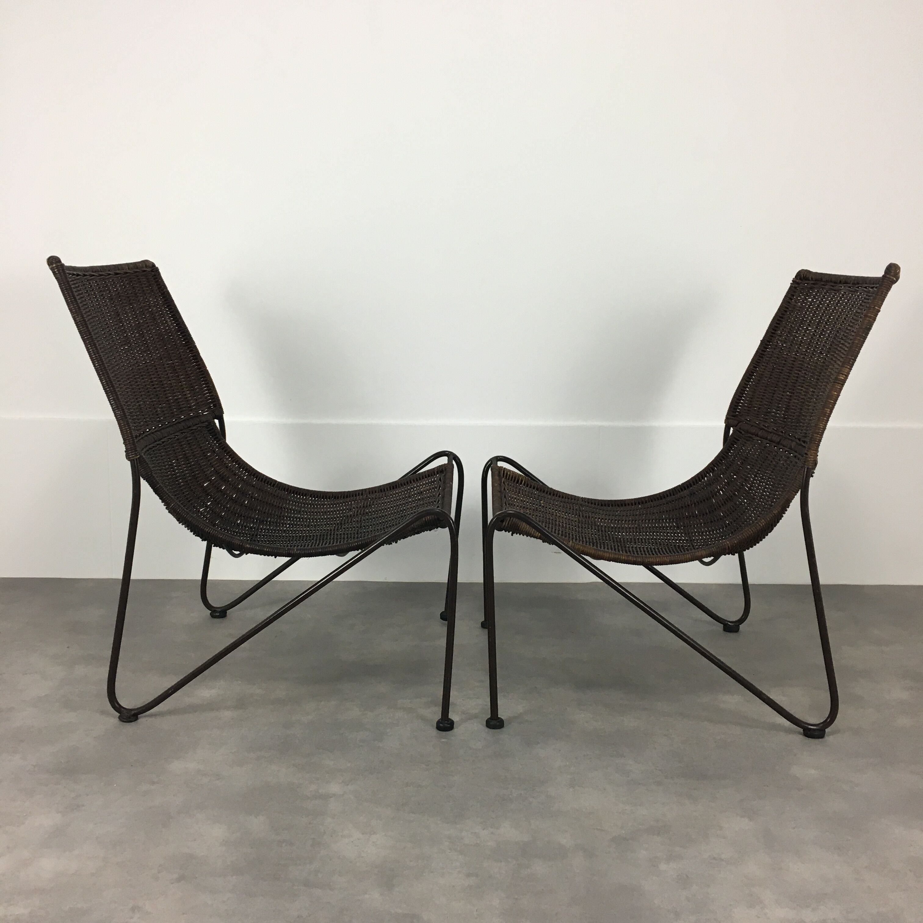 Pair of rattan and steel wire armchairs by frederick weinberg