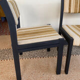 2 wooden chairs and vintage fabric