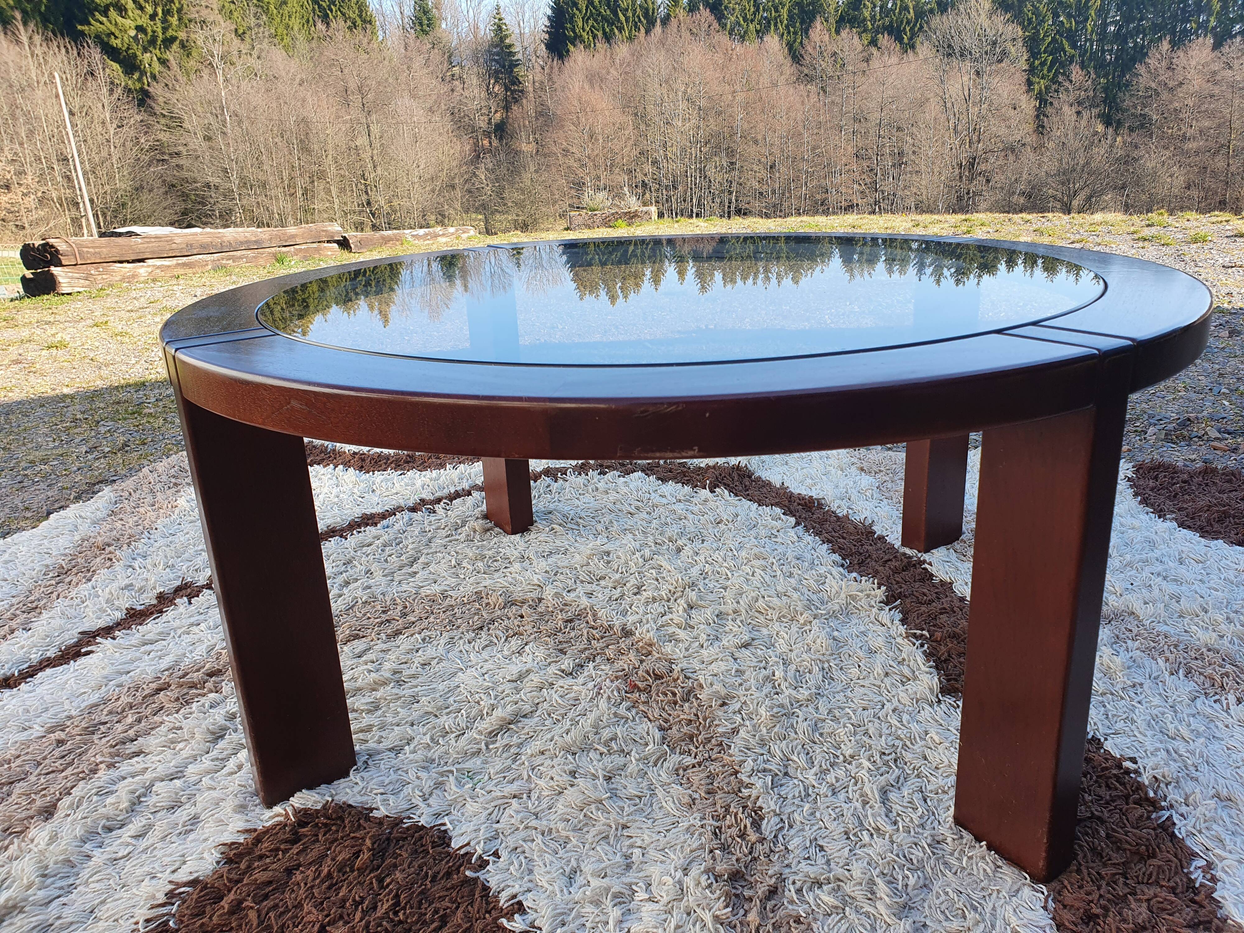 Teak coffee table and smoked glass from the 70s