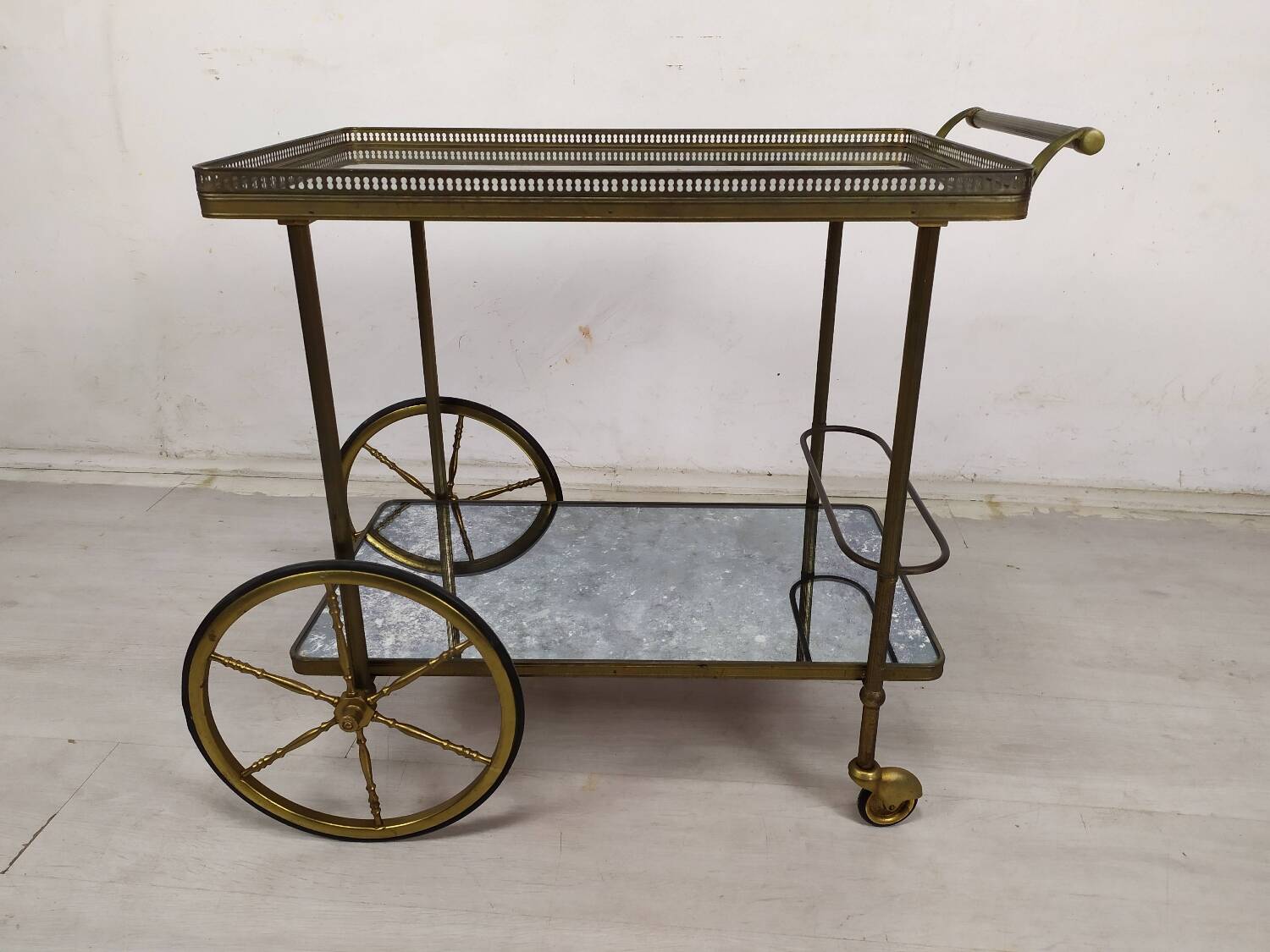 Brass and glass rolling trolley