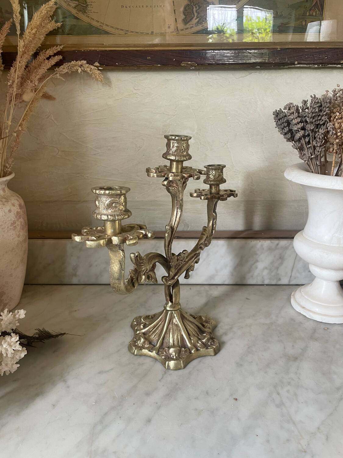 Old gilded bronze candlestick