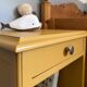 Honey yellow bedside table