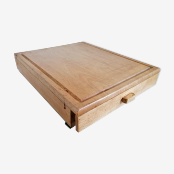 Cutting board with knife storage drawer