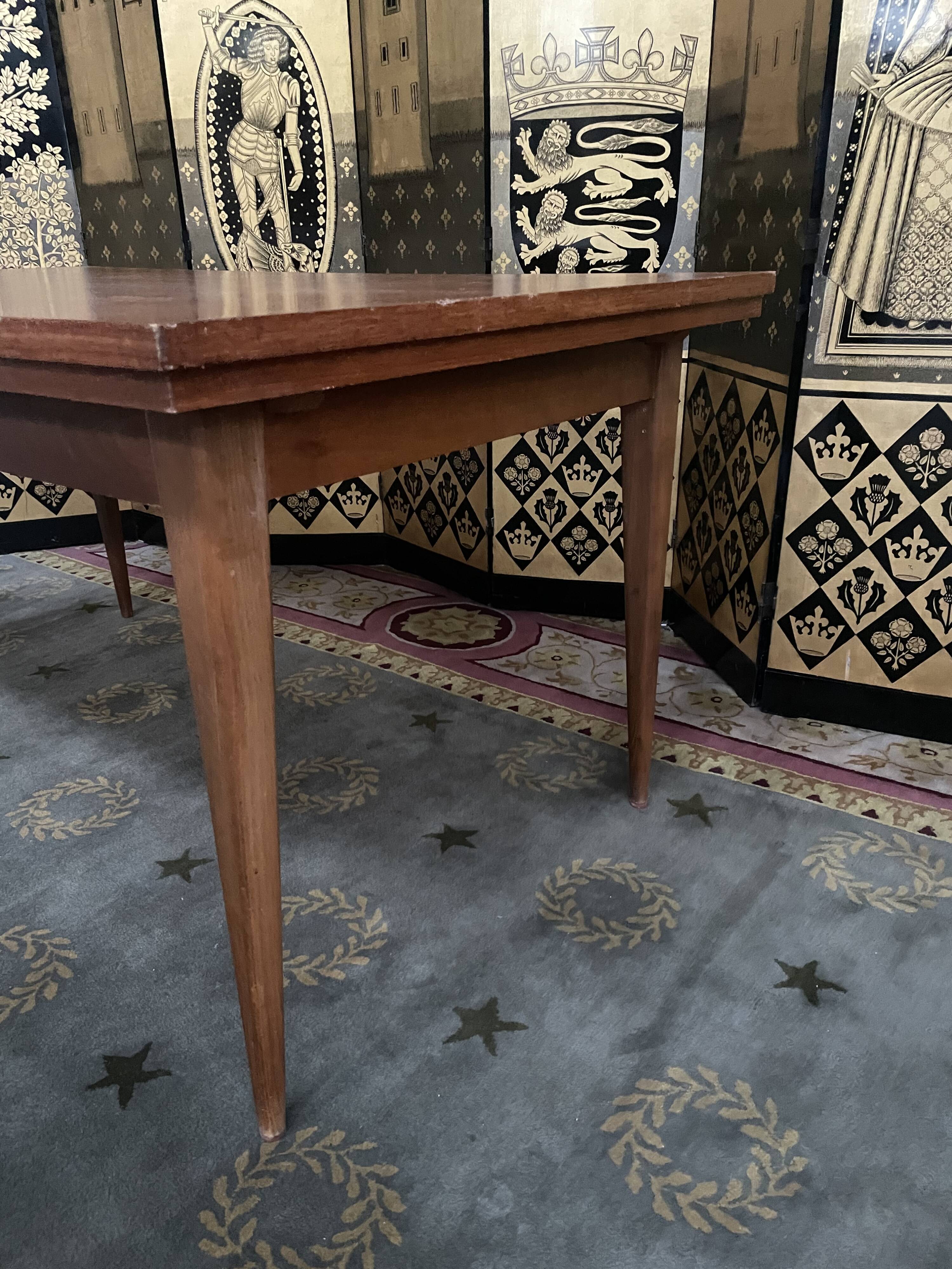 Scandinavian dining table with built-in extensions