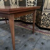 Scandinavian dining table with built-in extensions