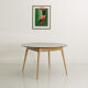 Round table, black lacquered top, solid oak base