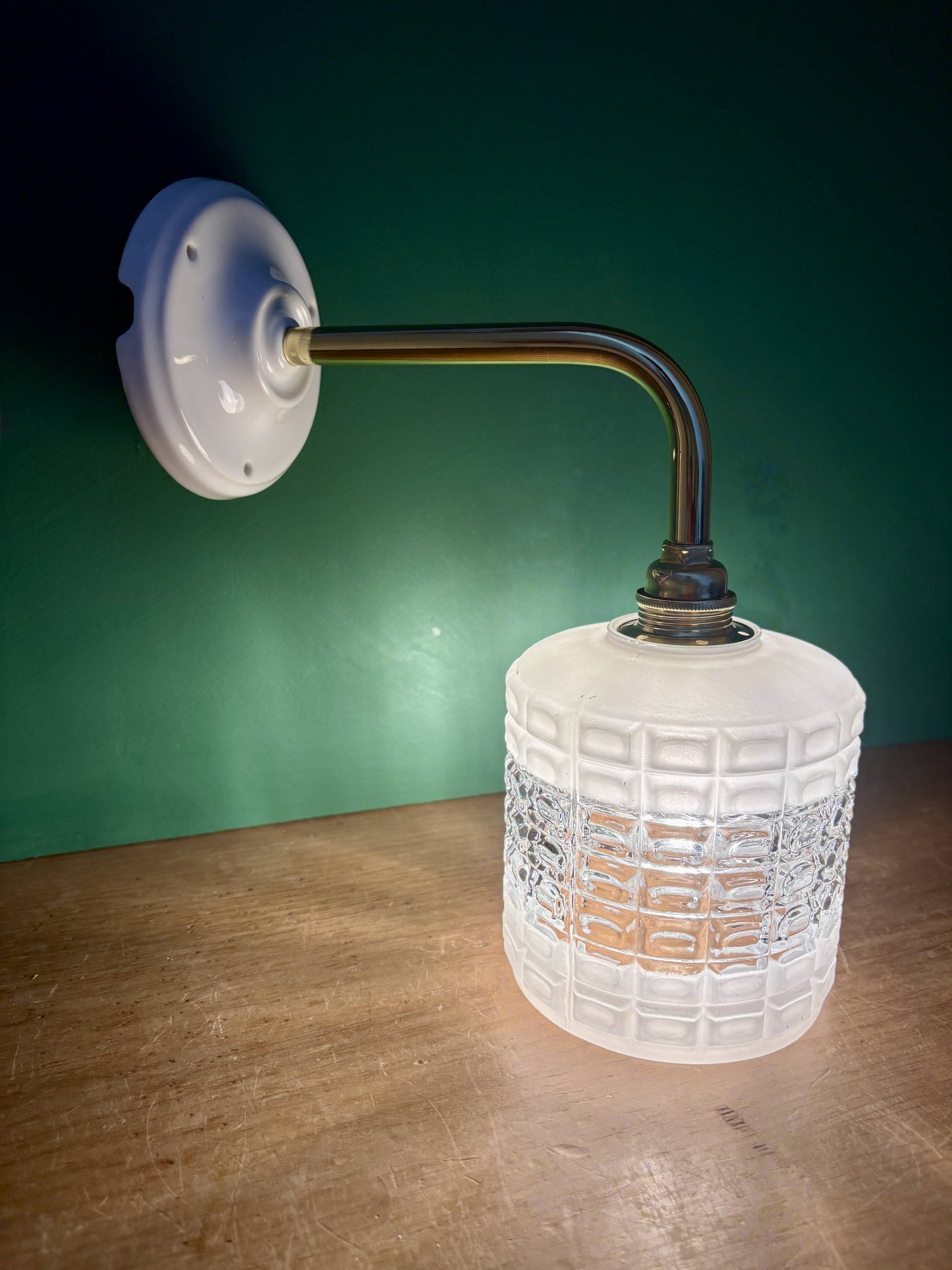 Vintage globe angled wall light in white and clear glass